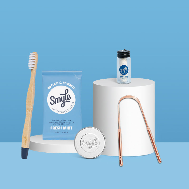 The Essential Travel Pack: Tabs + Floss + Tongue Cleaner + Bamboo Brush + Travel Tin